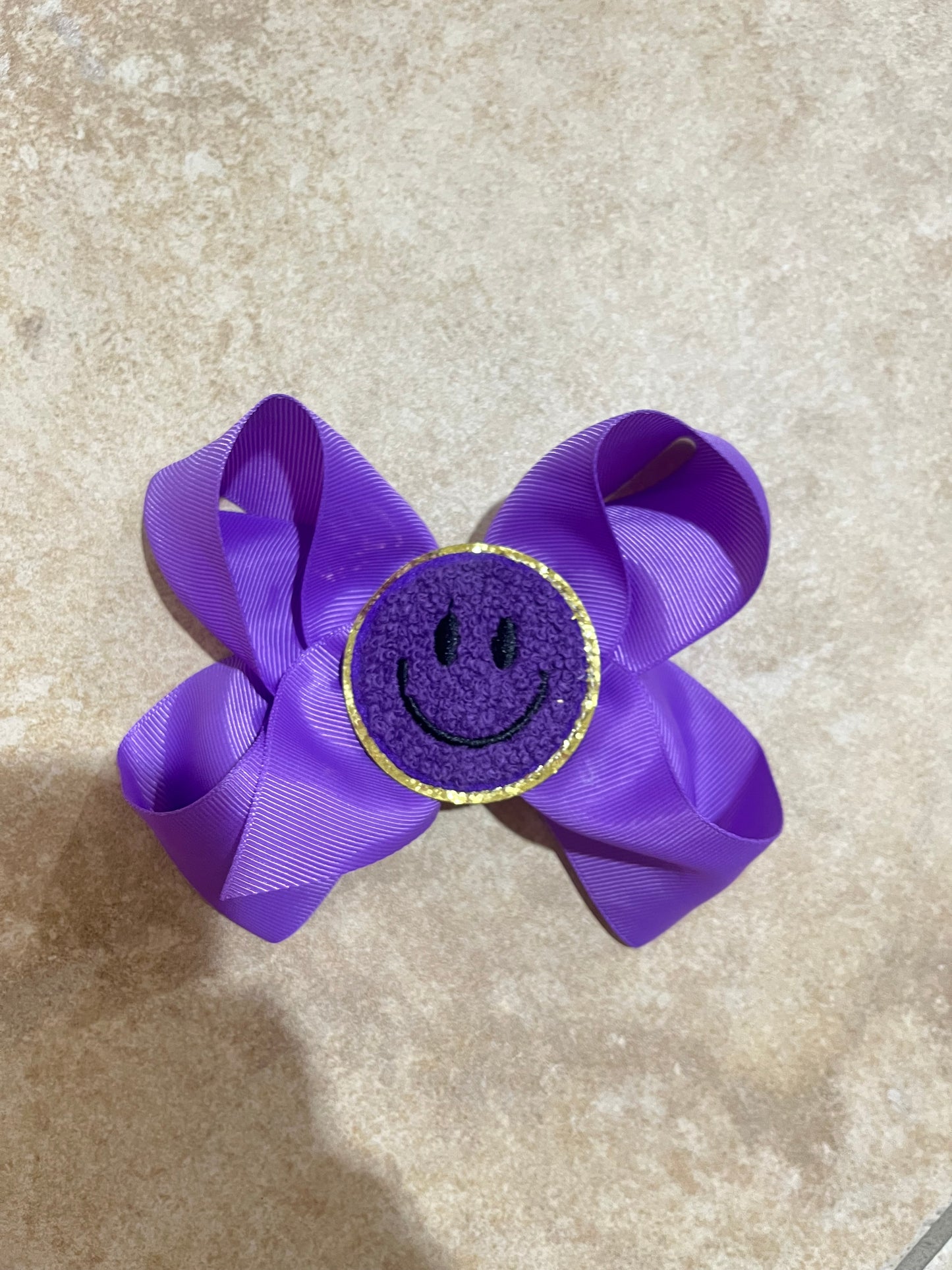 Large Smiley Face Bow